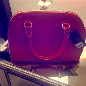 F21 red patent handbag